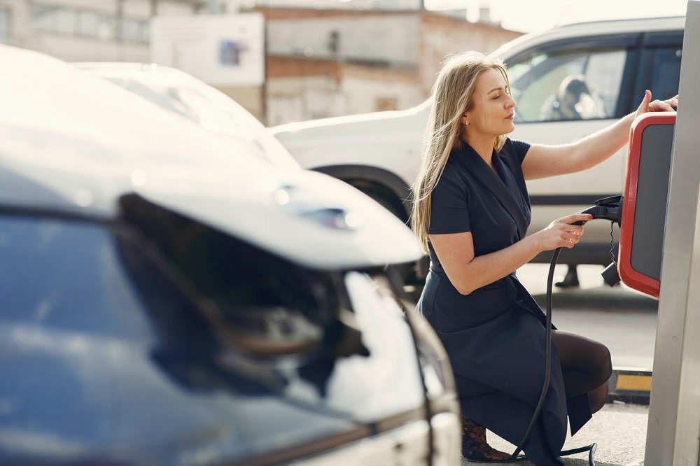 Girl charging her car