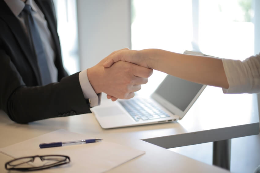 Employer and Employee Handshake