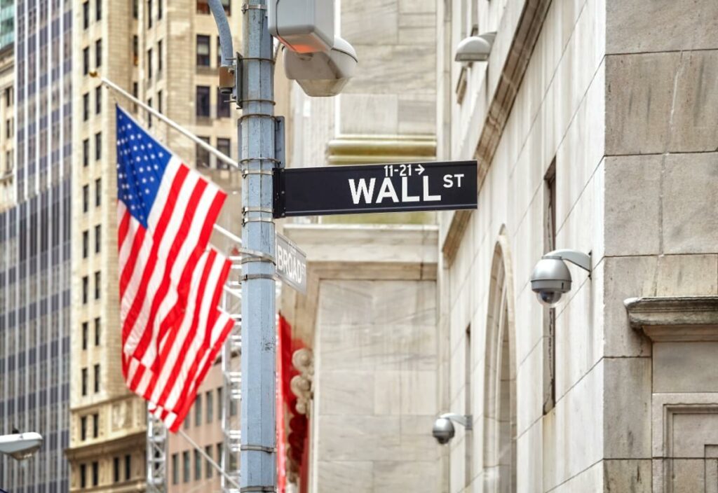 Wall Street Sign with American Flag