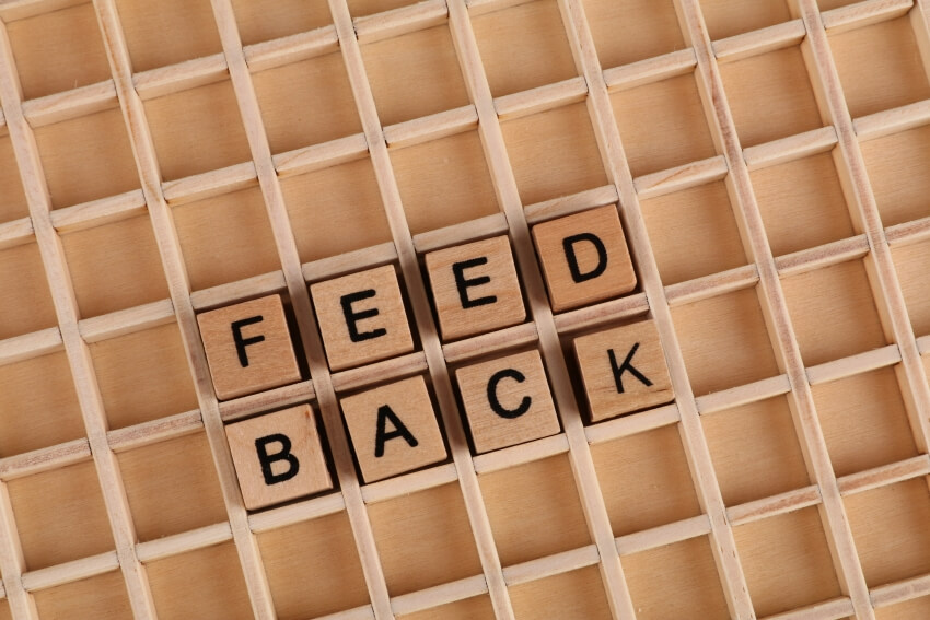 Feed Back Words Spelled in a Wooden Box