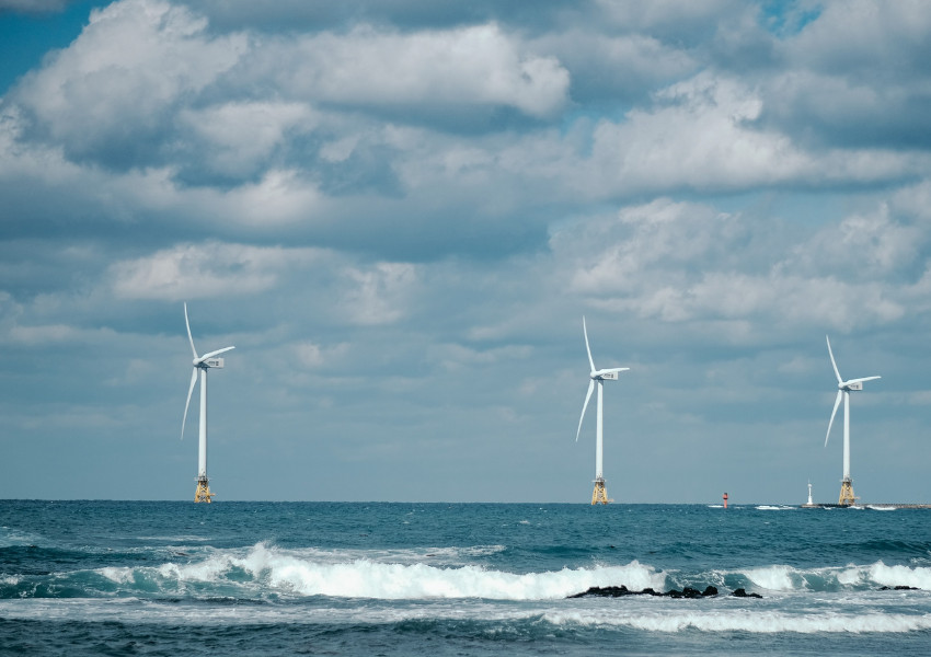 Wind turbines in the ocean.