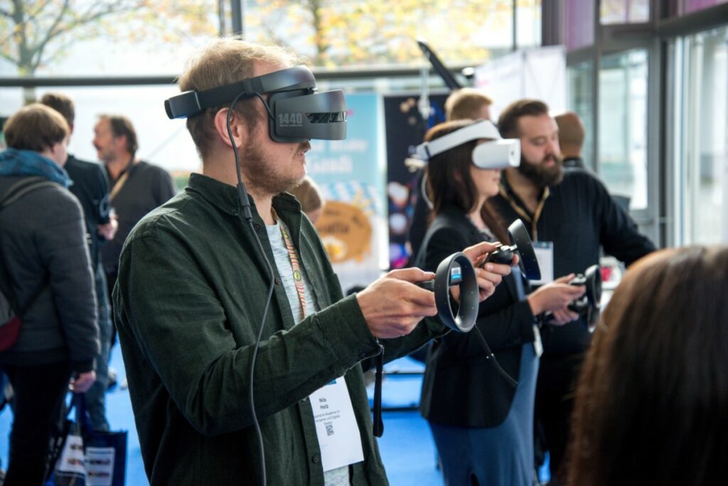 people wearing VR bands to check virtual world