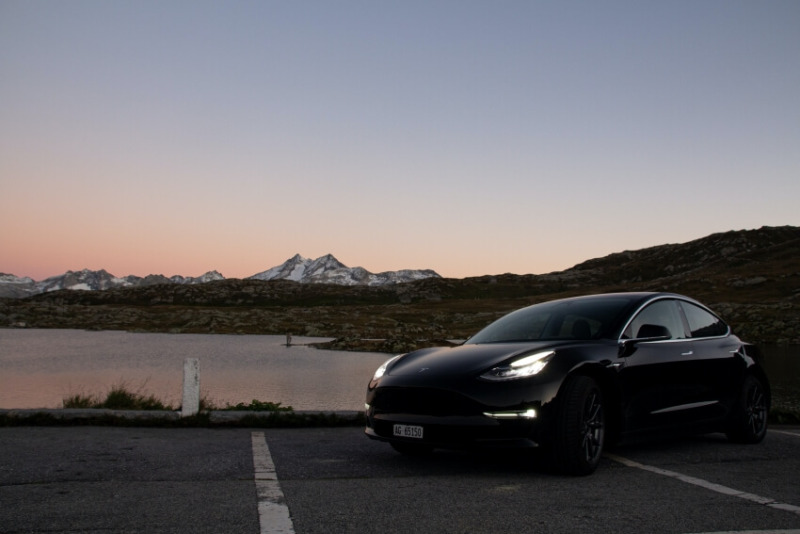 A Black Car by the Lake