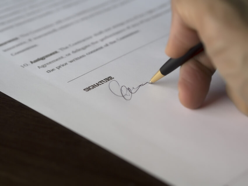 Signing on a Contract