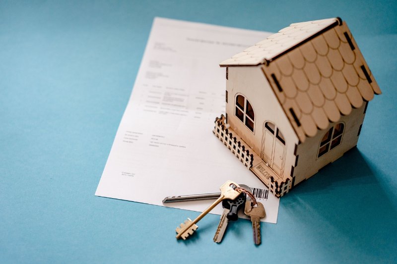 House Keys and a Wooden House