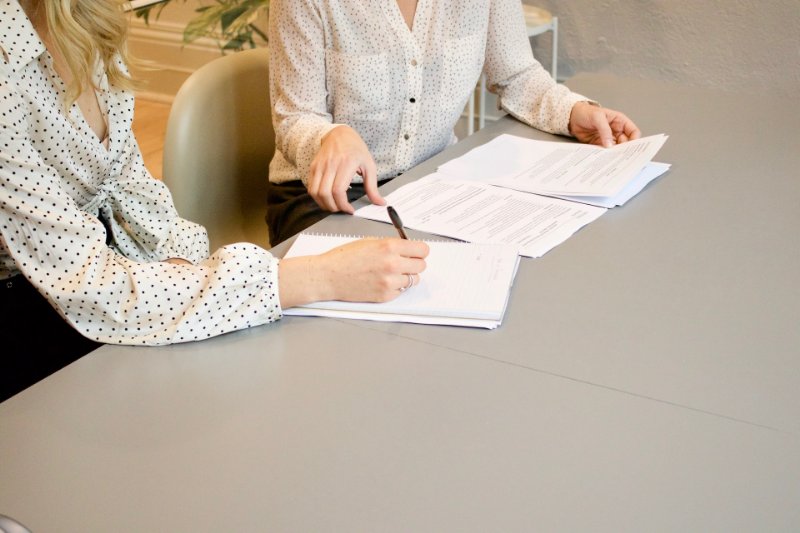 Two People Discussing and Negotiating