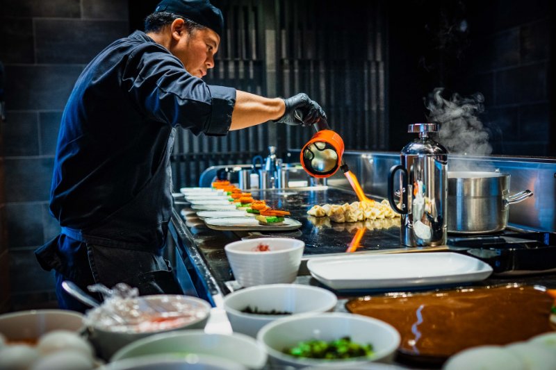 Restaurant Chef Cooking a Meal