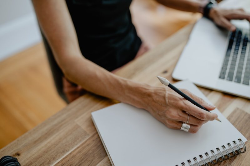 Woman Taking Notes