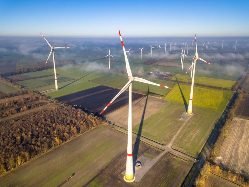 Aerial View of Wind Turbines in Rural Farm