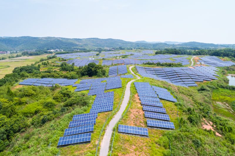 Aerial View of a Hillside Solar Plant