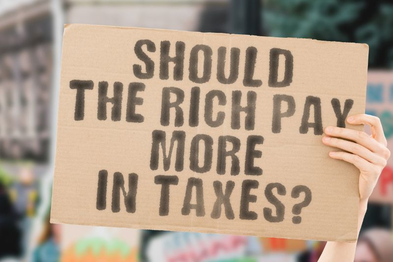 Should the Rich Pay More in Taxes Sign