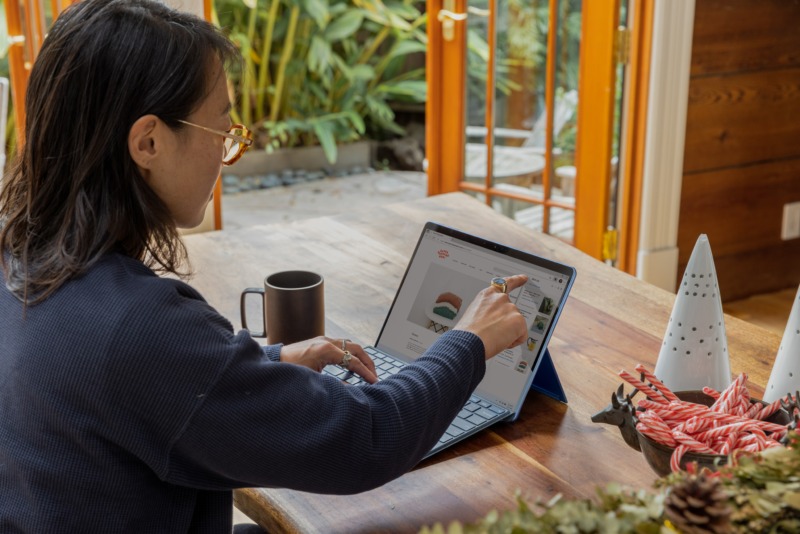 Female professional working on a café