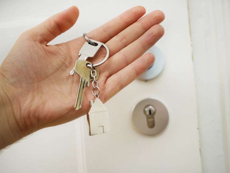 Holding a House Key