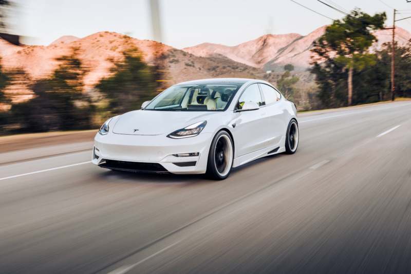 Running Tesla Model 3 in the street