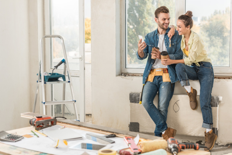 Couple renovating a room